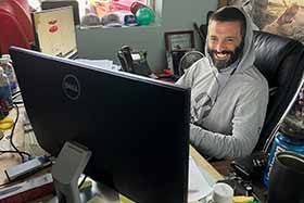 Person sitting at a desk.