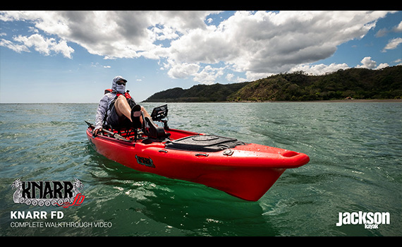 Person running waves offshore kayak.