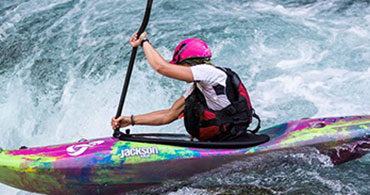 Person kayaking in whiewater for mobile screens.